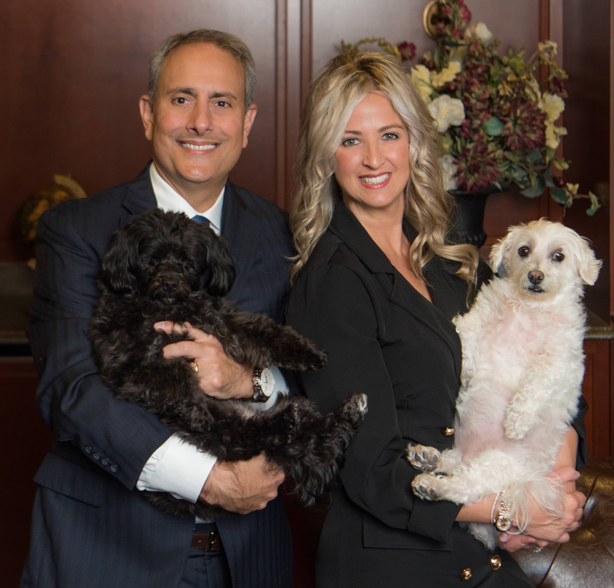 Tony and Tanya Georgelis with their dogs.