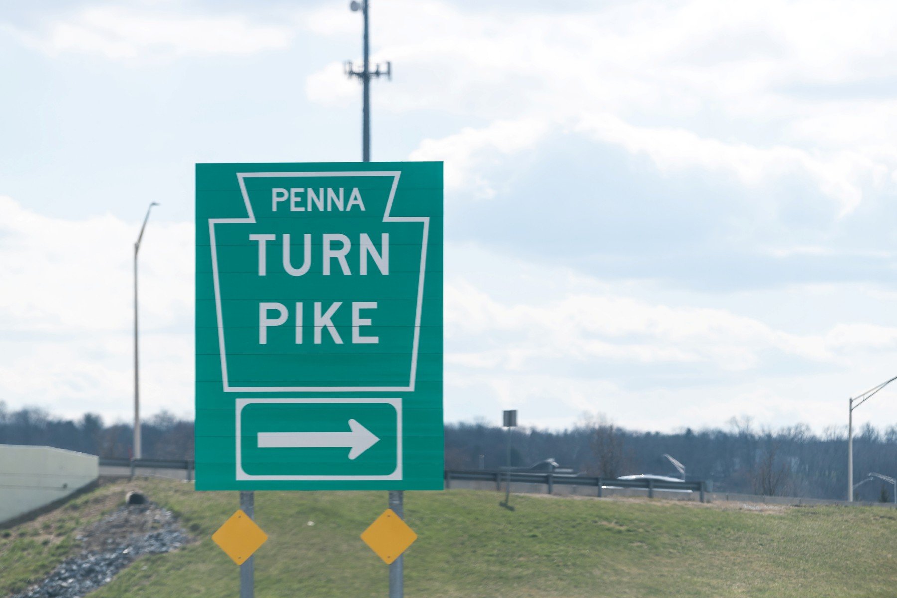 PA turnpike sign at entry ramp.